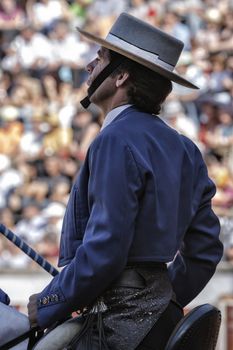 Pozoblanco, Corodoba province, SPAIN- 25 september 2011: Spanish bullfighter on horseback Pablo Hermoso de Mendoza bullfighting on horseback looking attentively at the bull to start the third of banderillas in Pozoblanco, Cordoba province, Andalusia, Spain