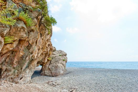 grotto in the rock on the sea beach