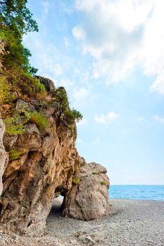 grotto in the rock on the sea beach