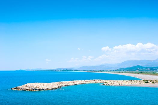 Artificial breakwater in shallow warm waters of the Mediterranean Sea. Demre, Antalya, Turkey