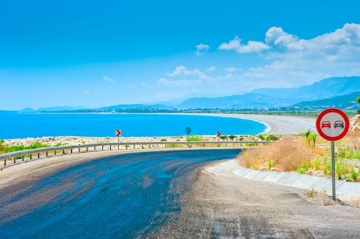 road leading from the mountains to the beach