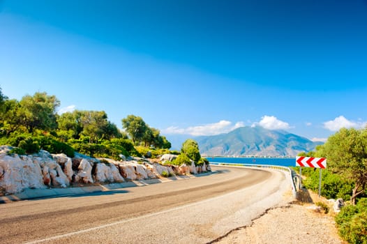 highway along the sea on a background of mountains