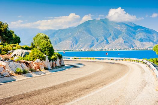 sharp bend in the road and the view of the mountain