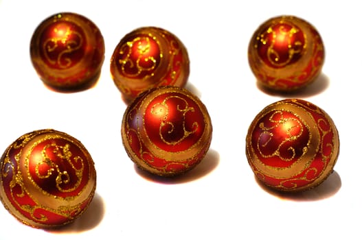 Composition of red Christmas balls with golden pattern