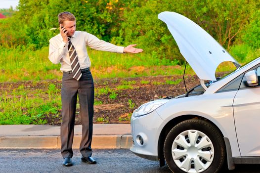 businessman in a car crash