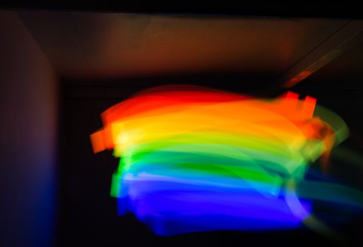 Abstract rainbow form of light in long exposure.