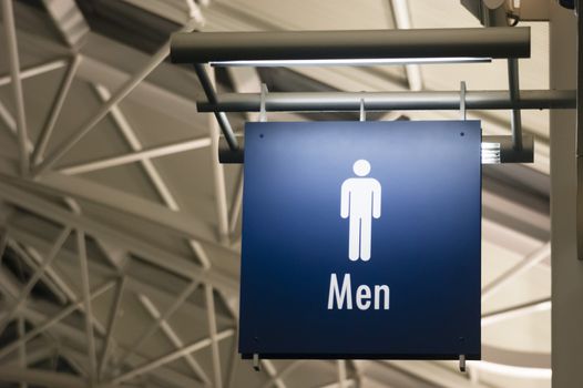 The Sign for Men's Lavatory Male Bathroom in a Public Building Business Place