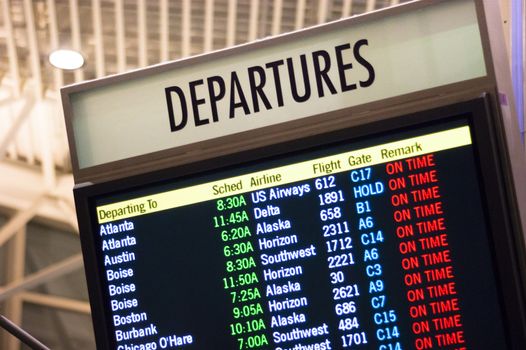 Larger than Life Size Depature Schedule Sign at Local Airport Flight Center