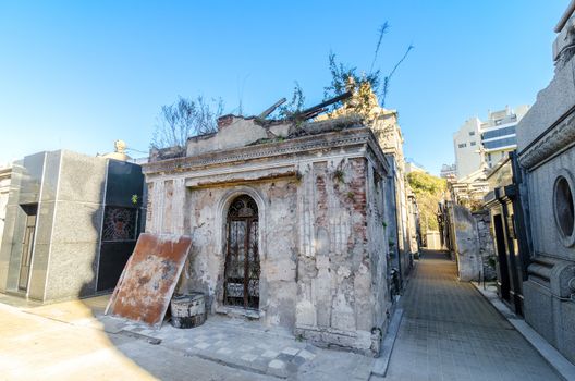 Old and damaged tomb in the historic Recoleta cemetery in Buenos Aires, Argentina