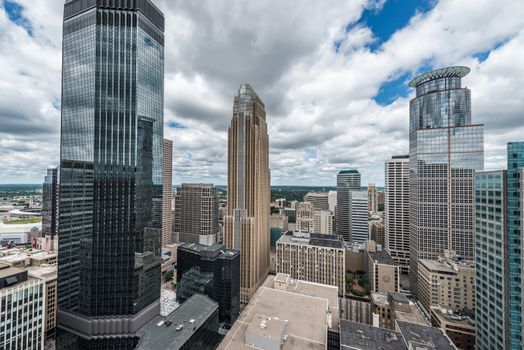 Cityscape of downtown Minneapolis Minnesota and surrounding urban during a sunny day