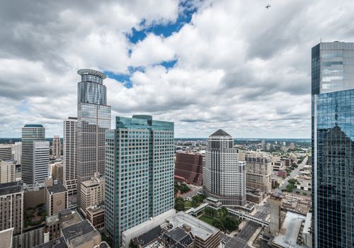 Cityscape of downtown Minneapolis Minnesota and surrounding urban during a sunny day