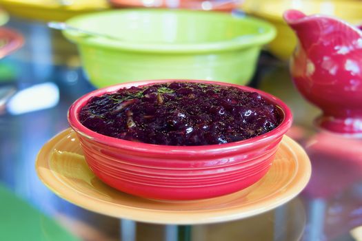 Cranberry Sauce in Red Bowl for Thanksgiving Dinner Closeup