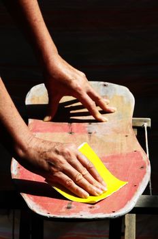 Restore an Old Skateboard with a Yellow Sandpaper