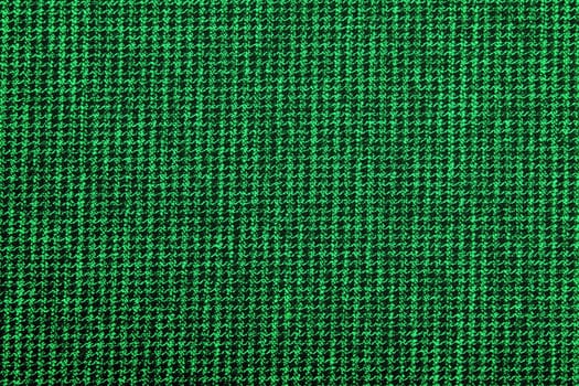 Material into small, green grid, a textile  background.