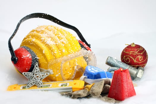 Safety New Year- protective equipment on artificial snow