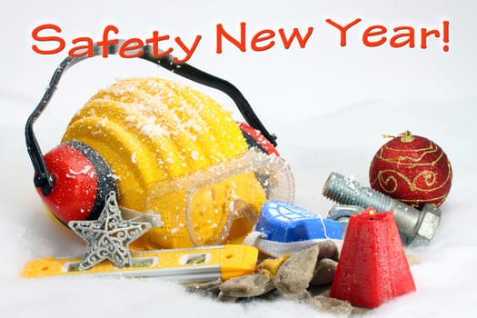 Safety New Year- protective equipment on artificial snow