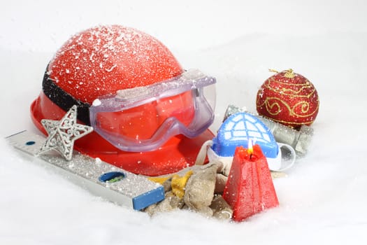 Safety New Year- protective equipment on artificial snow