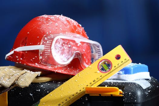 Safety New Year- protective equipment on artificial snow