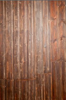 Wall decorated by old wooden planks