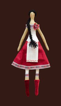 The FS Handmade isolated doll girl in Ukrainian folk style dress