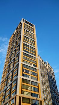 Modern apartment buildings against blue sky in China 