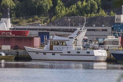 The boat is moored to the dock at the port of Halden, Norway and built of steel