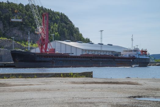 Russian cargo ship moored to the dock at the port of Halden, Norway