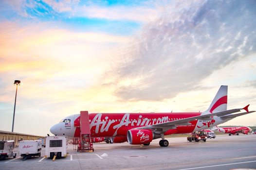Kuala Lumpur, Malaysia - May 14, 2013: AirAsia Jet airplane in Kuala Lumpur airport in Kuala Lumpur. Its been named as world's best low-cost airline, operates scheduled flights to 78 destinations