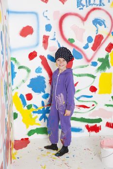 Little Girl painting a room