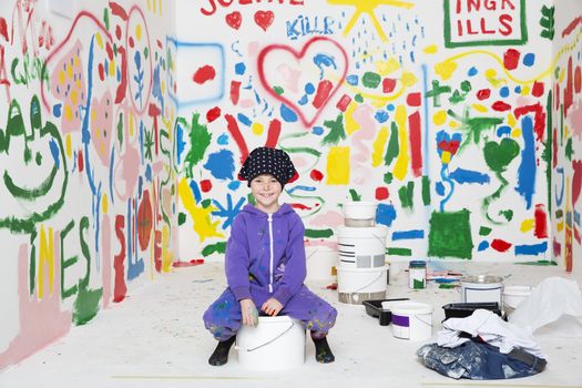 Little Girl painting a room