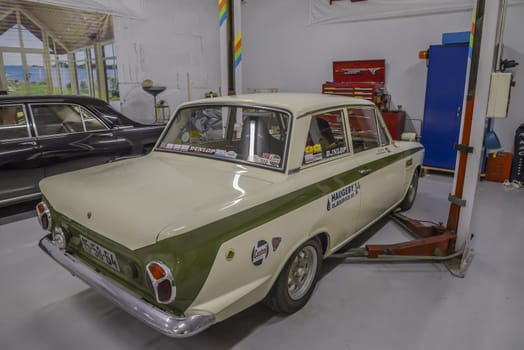 All the photos are shot in a garage in Halden, Norway where race cars and racing motorcycles are maintained and overhauled