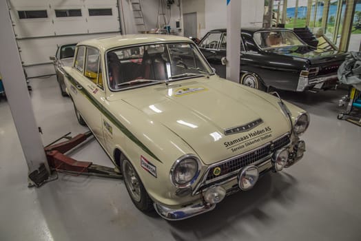 All the photos are shot in a garage in Halden, Norway where race cars and racing motorcycles are maintained and overhauled