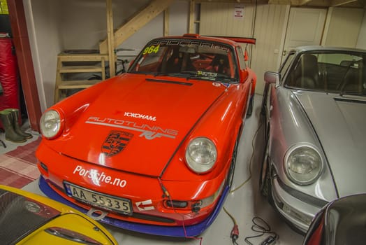 All the photos are shot in a garage in Halden, Norway where race cars and racing motorcycles are maintained and overhauled