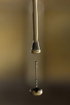 The fluid motion of water splashing as it is poured. 