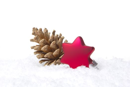 christmas, decoration with poinsettia as christmas bauble red and pine cone 