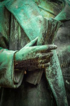 Graduation Image Of Old Statue Holding Academic Scroll