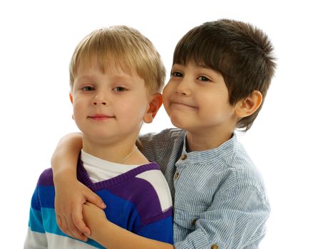 Two Little Boys Embraces and Smiling