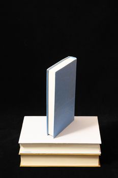 One Empty Book Isolated on a Black Background