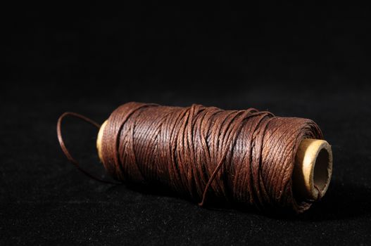 Roll of Twine isolated on a Black Background