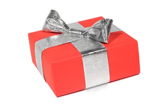 Red gift box with silver ribbon isolated on white