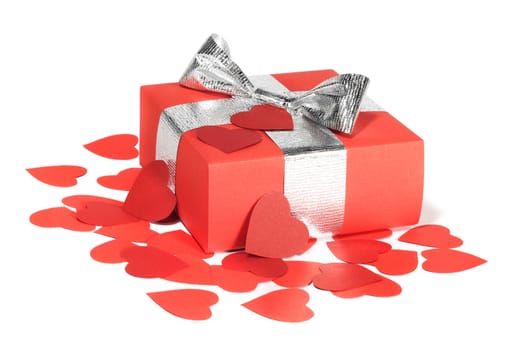 Valentines Day gift in red box and small hearts isolated on white