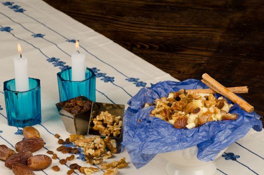 Haroset and its ingredients displayed on a festive table