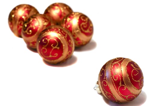 Composition of red Christmas balls with golden pattern