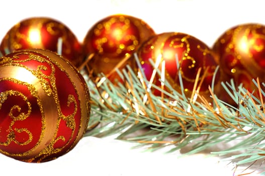 Composition Christmas red balls with gold pattern and tinsel