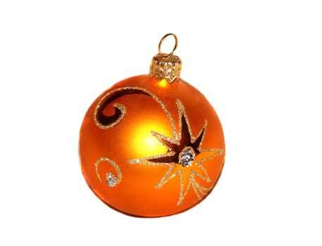 One orange Christmas ball with golden pattern                          