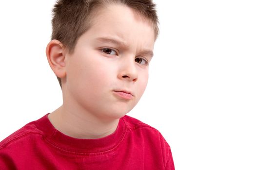 Young boy frowning at you unappreciatively, you better to listen what he asks