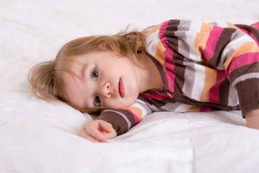 Toddler girl cannot keep her head up, perhaps her sleep time passed