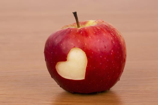 Heart on the fresh apple, a Valentine' Day theme