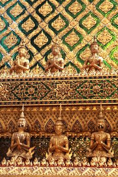 closeup the golden Buddhist temple gable in Thailand