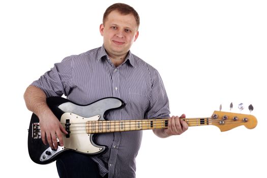 Young man playing guitar isolated on the white